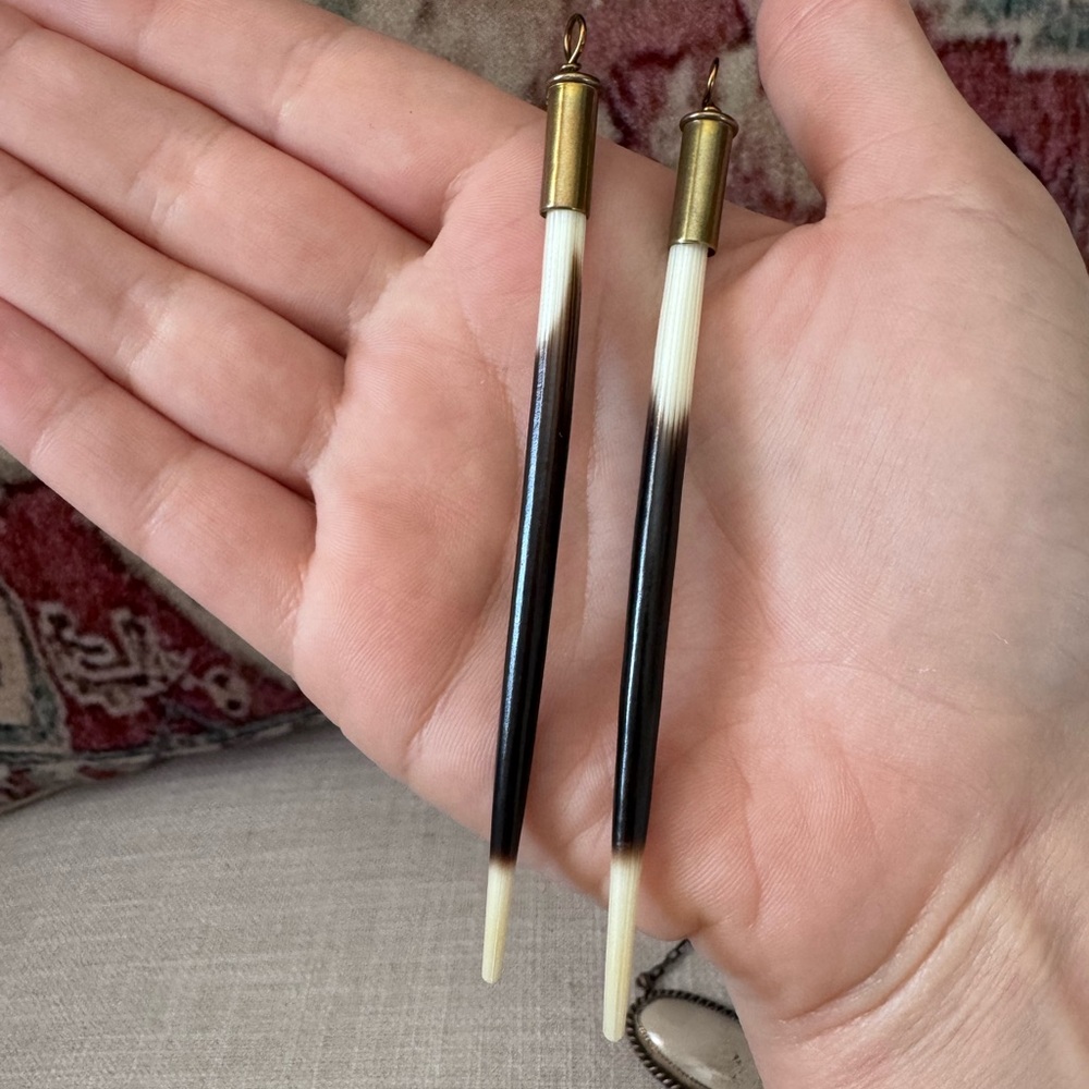 Brass Bullet Case, Porcupine Quill, Hammered Brass Earrings. Worn by Beth Dutton
